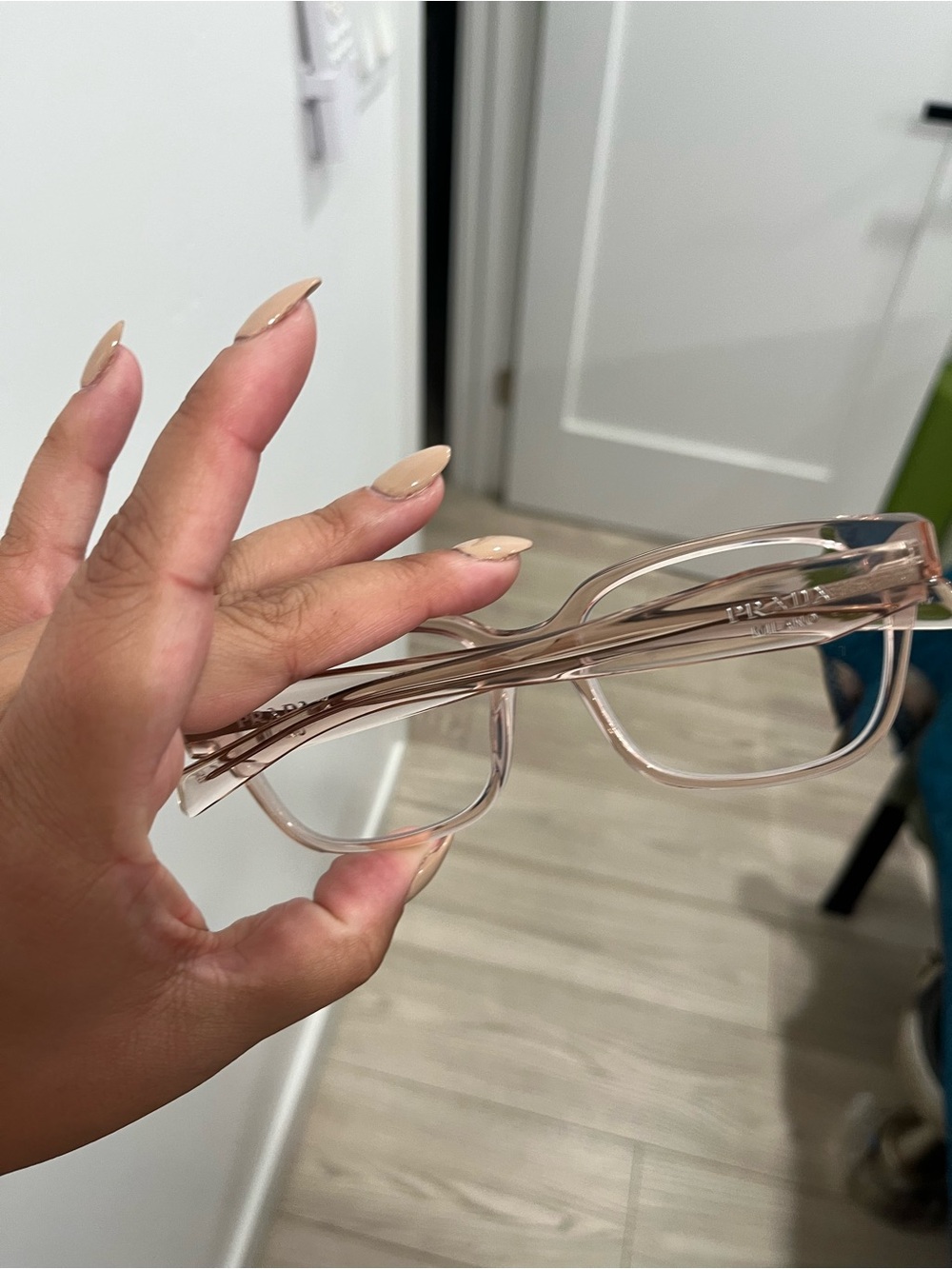 Pale transparent pink Prada eyeglass frame